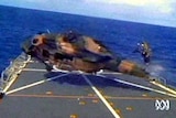 Two people were killed when the helicopter smashed into the deck of the HMAS Kanimbla.