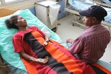 Alice Kabamara recovers in a Lae hospital after the MV Rabaul Queen's sinking