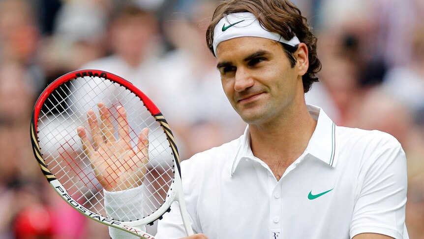 Roger Federer celebrates his second round win at Wimbledon.