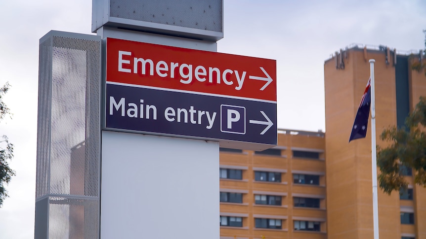 A sign points to Canberra Hospital's emergency department.