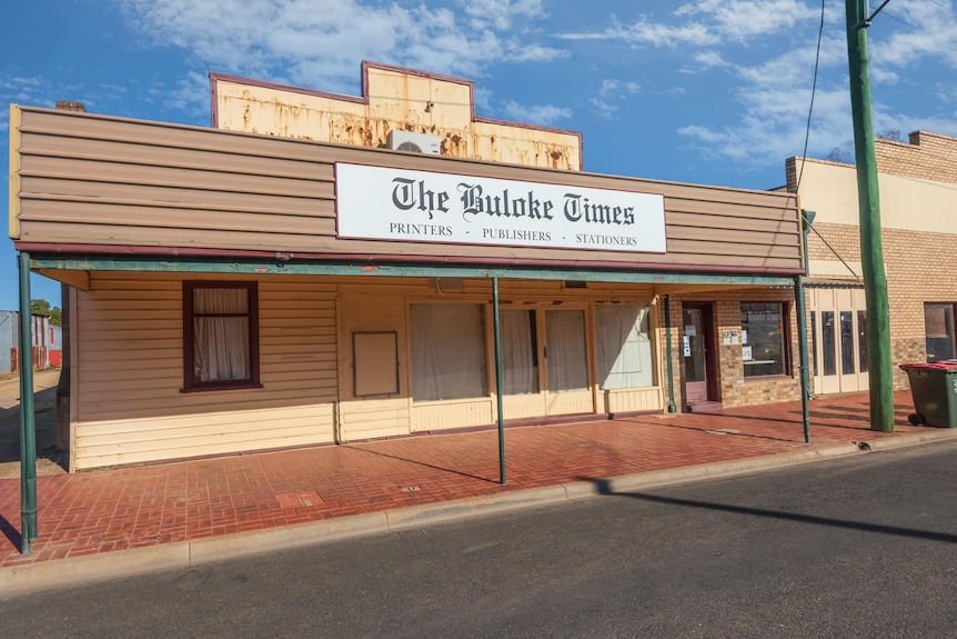 The exterior of an old shop. A sign reading "The Buloke Times" hangs from the awnings