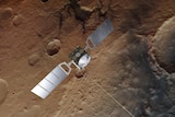 A space rover above red dirt