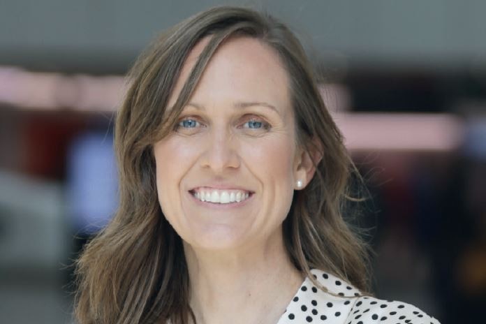 A portrait of a female doctor smiling