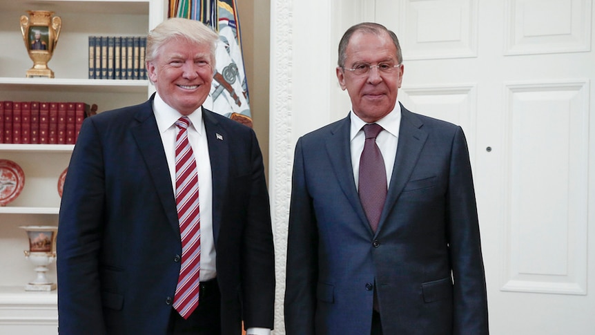 US President Donald Trump and Russian Foreign Minister Sergey Lavrov pose for a photo at the White House.