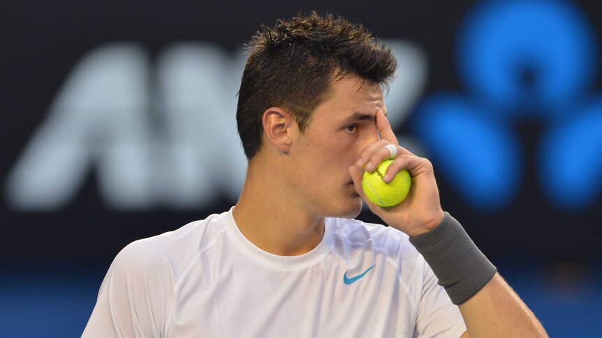 Tomic in control