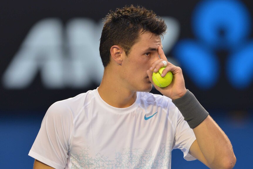 Tomic in control
