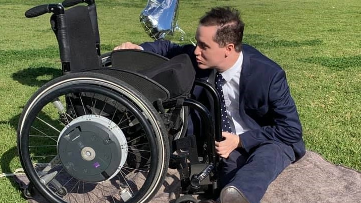 Adelaide reporter Charles Brice with his manual chair.