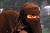 A woman in a burqa