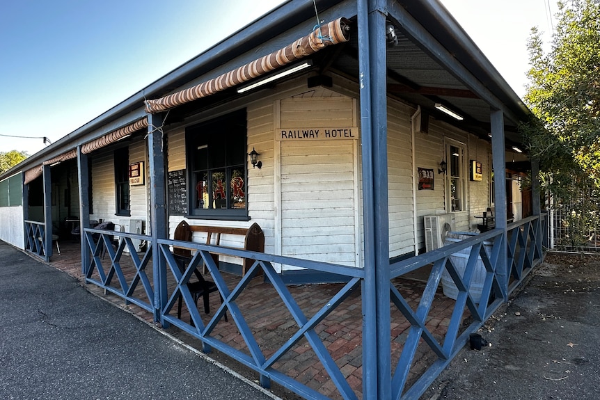 The outside of a weatherboard pub called the Railway Hotel.