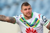 Josh Dugan on the sidelines during an NRL trial match for the Canberra Raiders in February.