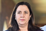 Queensland Premier Annastacia Palaszczuk looks serious at a media conference in Proserpine in north Queensland