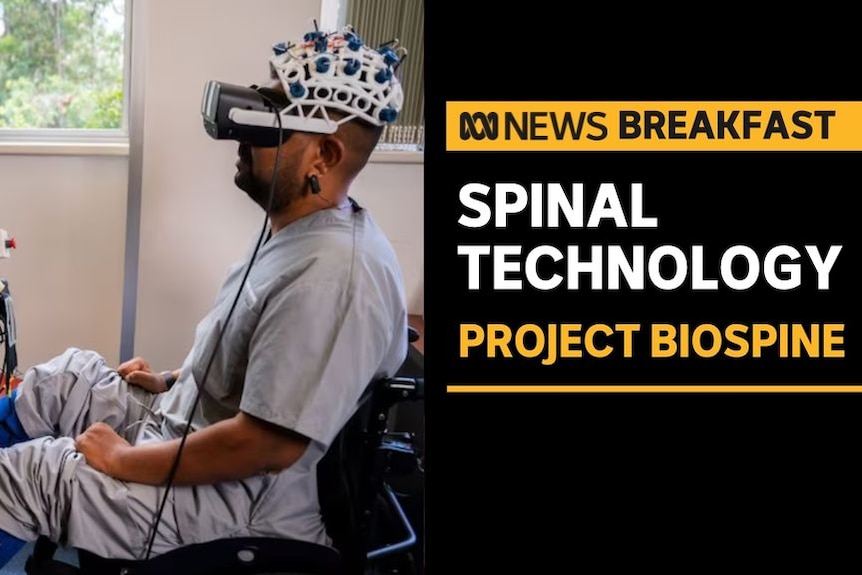 Spinal Technology, Project Biospine: Man sitting in hospital gown wearing VR goggles and electrodes on his head