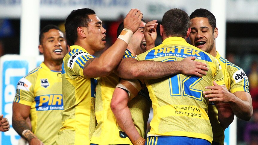 Smith congratulated after try
