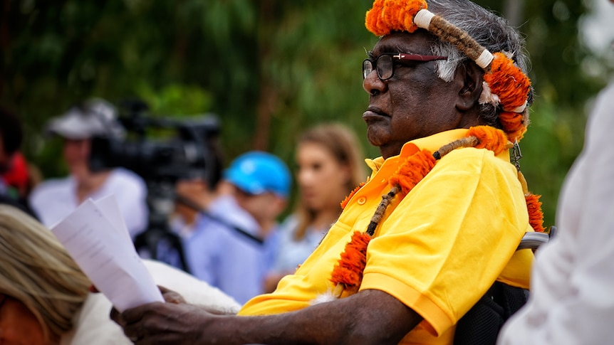 Indigenous leader Galarrwuy Yunupingu sits watching proceedings at the opening ceremony of the 2017 Garma Festival.