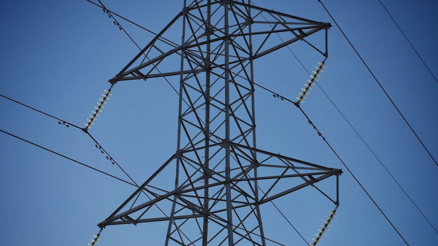 High tension power lines and blue sky in Brisbane.