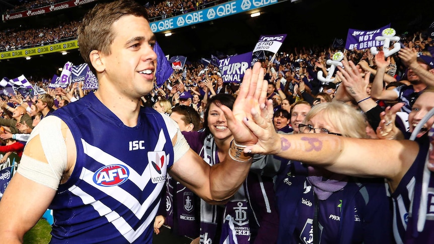 Fremantle's Stephen Hill acknowledges fans after the preliminary final against Sydney.