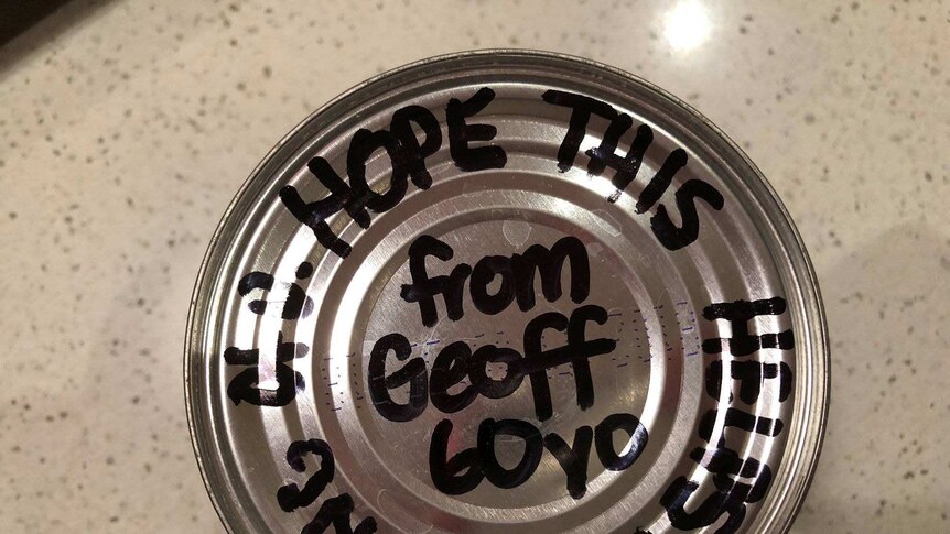 A can with a message written on top, signed Geoff.