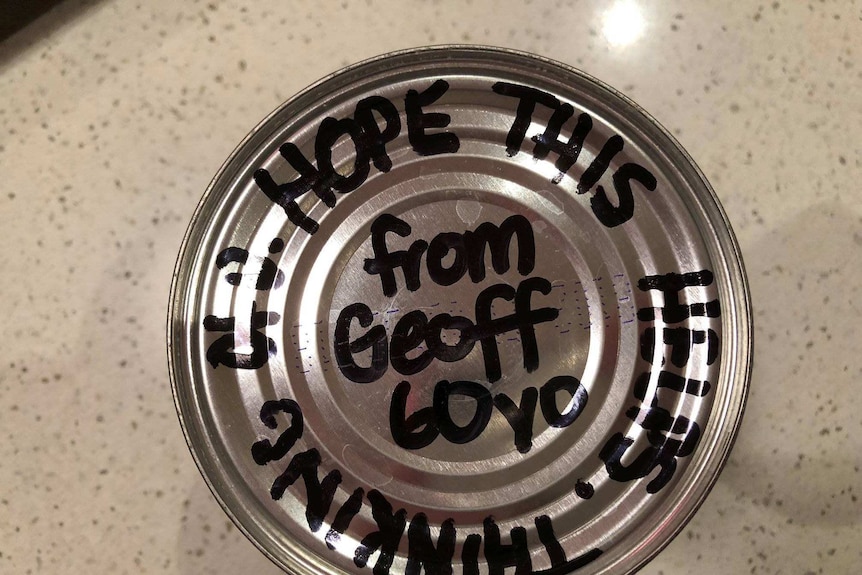 A can with a message written on top, signed Geoff.