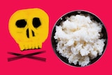 An illustration of a skull and cross bone next to a bowl of rice photographed from above.