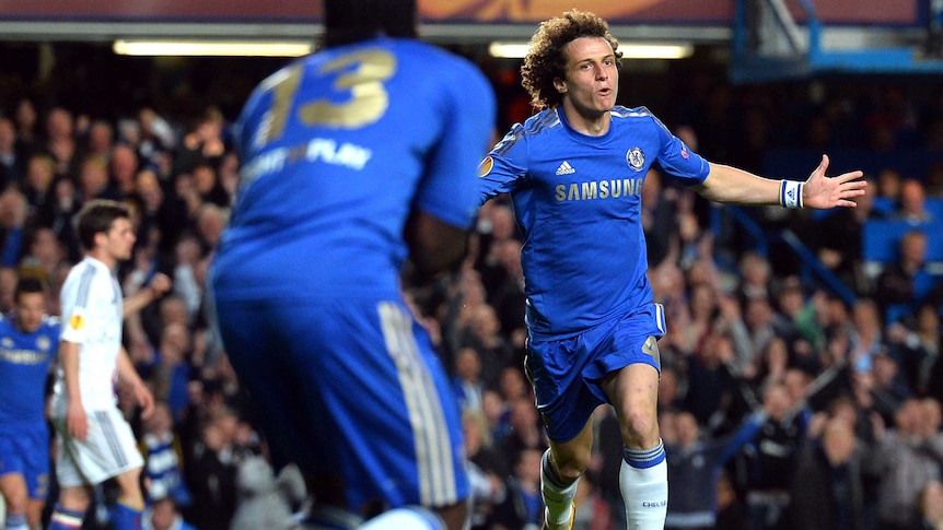 Chelsea defender David Luiz scores against FC Basel in the Europa League semi-final in May 2013.
