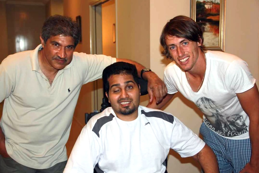 John Millman (right) with his friend Varun Lal (centre) and his father Vidur Lal (left).