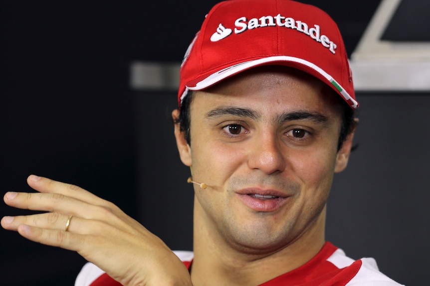 Ferrari Formula One driver Felipe Massa of Brazil attends a news conference