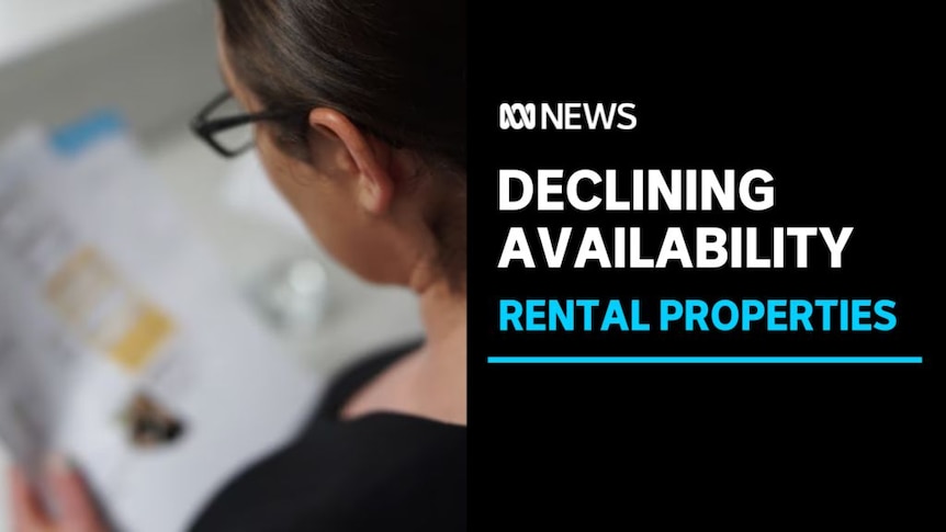 Declining Availability, Rental Properties: A woman in glasses examines a magazine