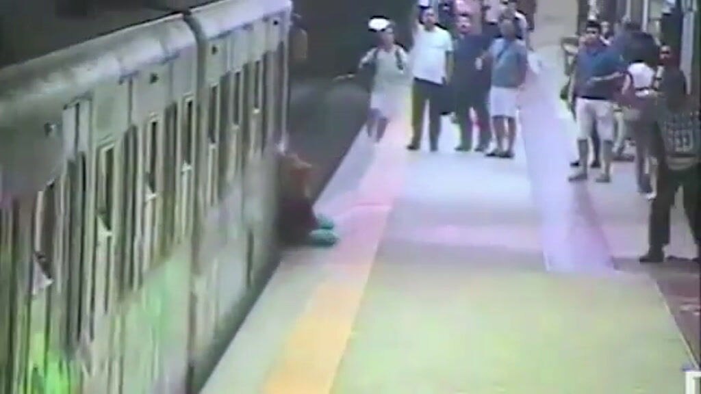 Woman dragged along Rome metro platform by train after bag gets caught ...