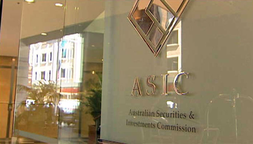 TV still of ASIC logo on glass door