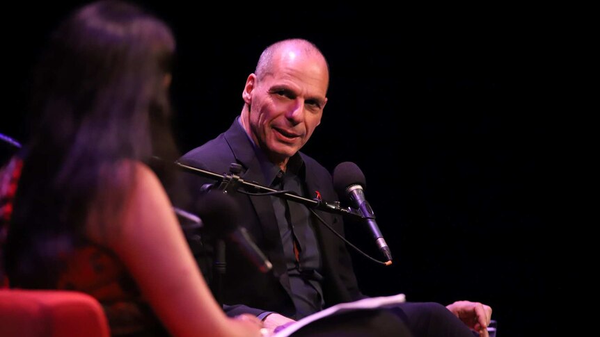 Economist Yanis Varoufakis talking with ABC business journalist Nassim Khadem.