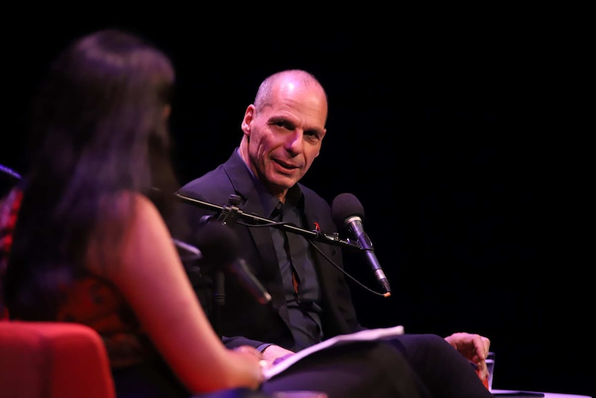 Economist Yanis Varoufakis talking with ABC business journalist Nassim Khadem.