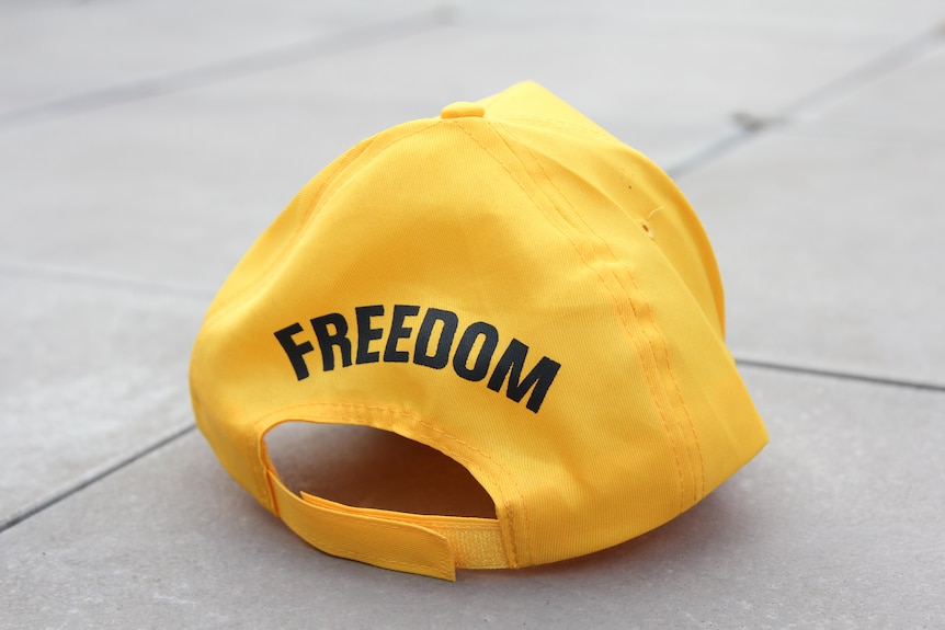 The back of a yellow United Australia Party cap with the words "freedom"