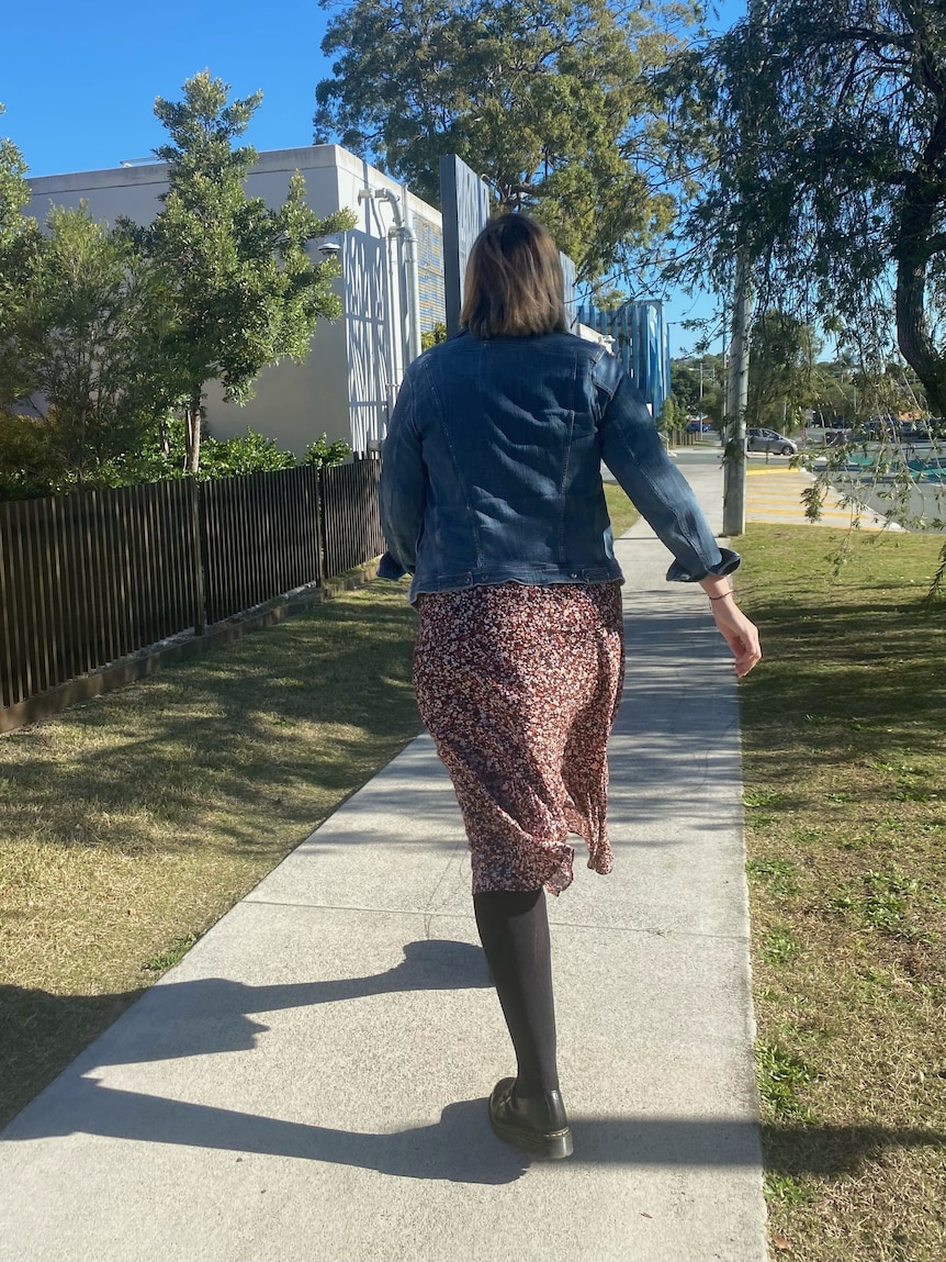 Sarah Lovell walks along a footpath