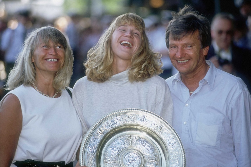 Peter Graf (R) with daughter Steffi at Wimbledon