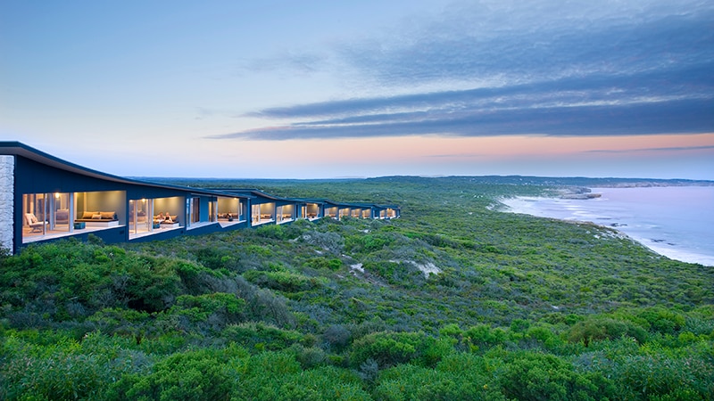 Luxury accommodation nestled in bushland, right on the coast.