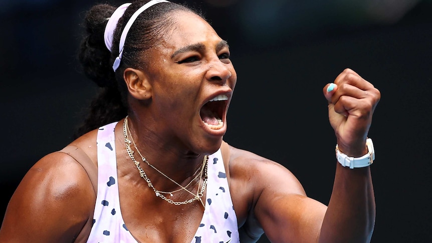 Serena Williams screams and pumps her fist