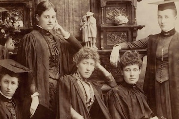 Sepia photo of women in academic robes