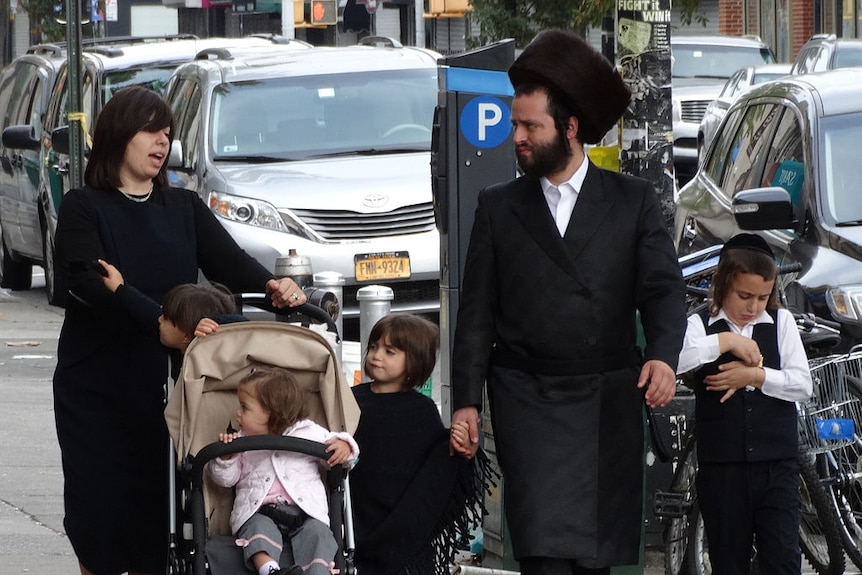 A Hasidic family in New York's Borough Park Hasidic district, Brooklyn, New York City