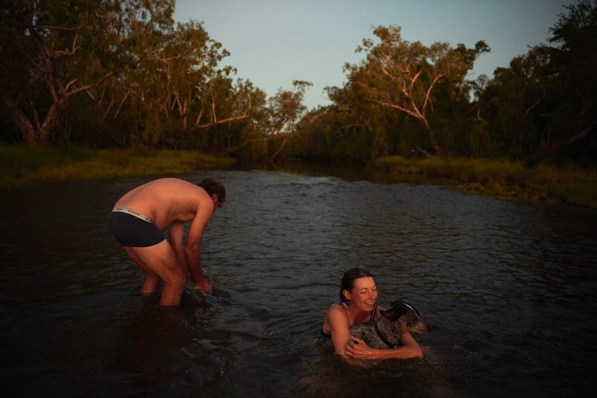 Nick And Joanna swimming at dusk