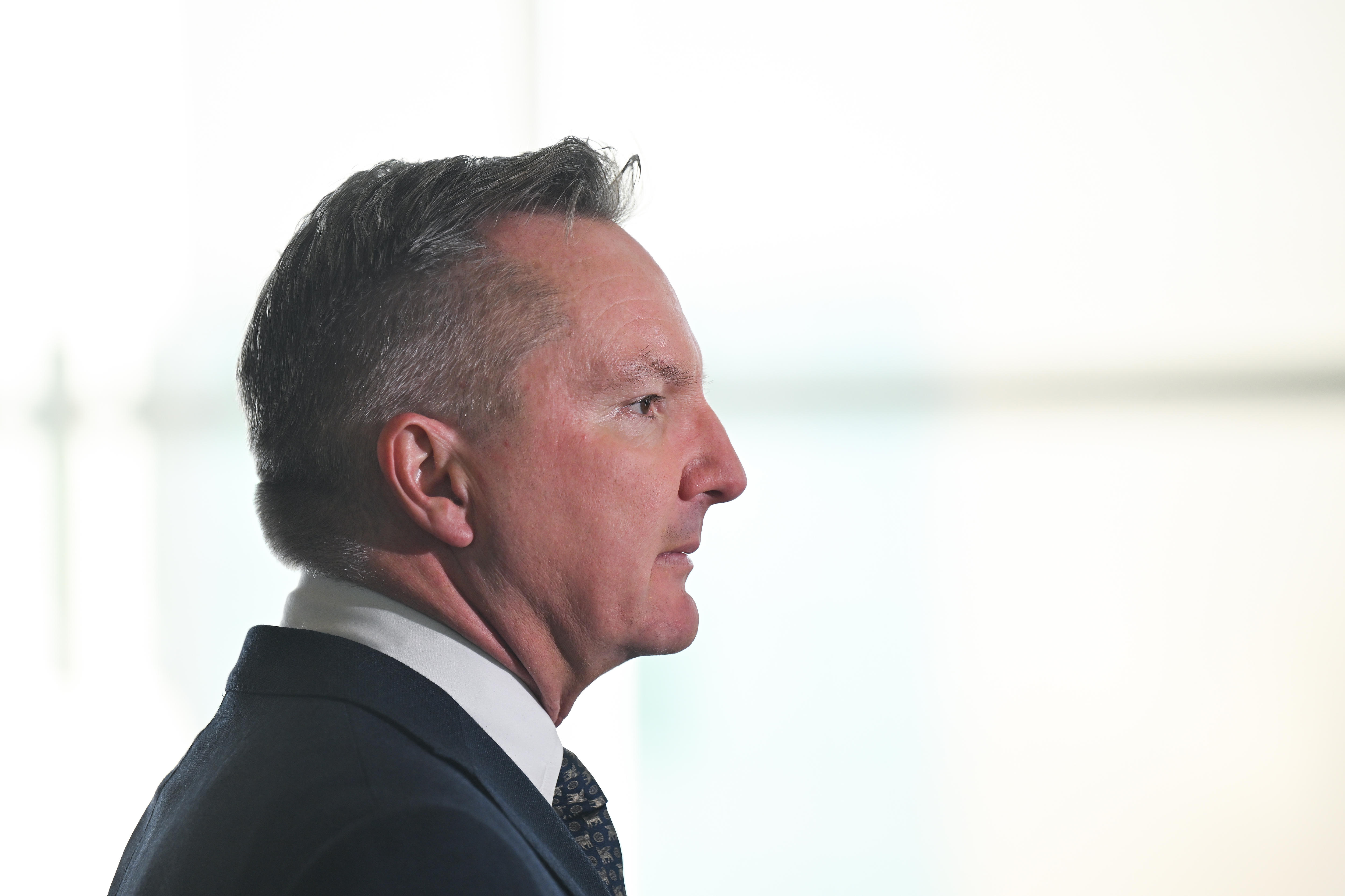 A photo of Bowen in profile, looking serious.