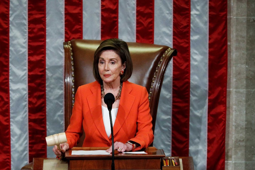 Nancy Pelosi lowers the gavel in the US House of Representatives