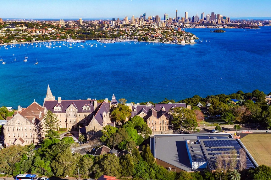 A wide view over Kincoppal Rose Bay showing solar panels on the fitness centre