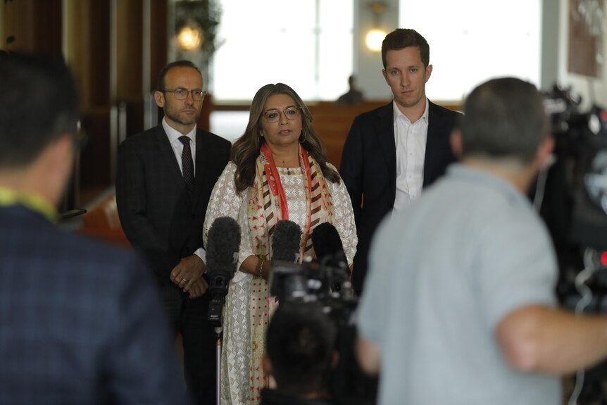  Mehreen Faruqi, Adam Bandt and Max Chandler-Mather  holding a press conference at Parliament House 