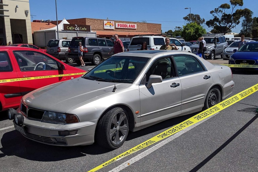 Crime tape surrounds a car at Goolwa.