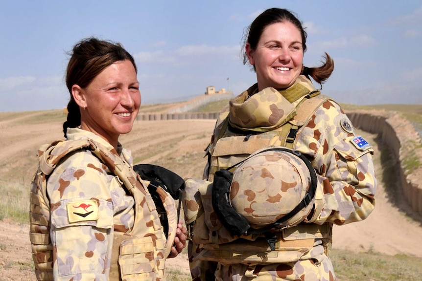 Corporals Ivona Bartush and Nicole Spohn serving in Afghanistan.