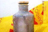 Toxic silver canister found on north Qld beach