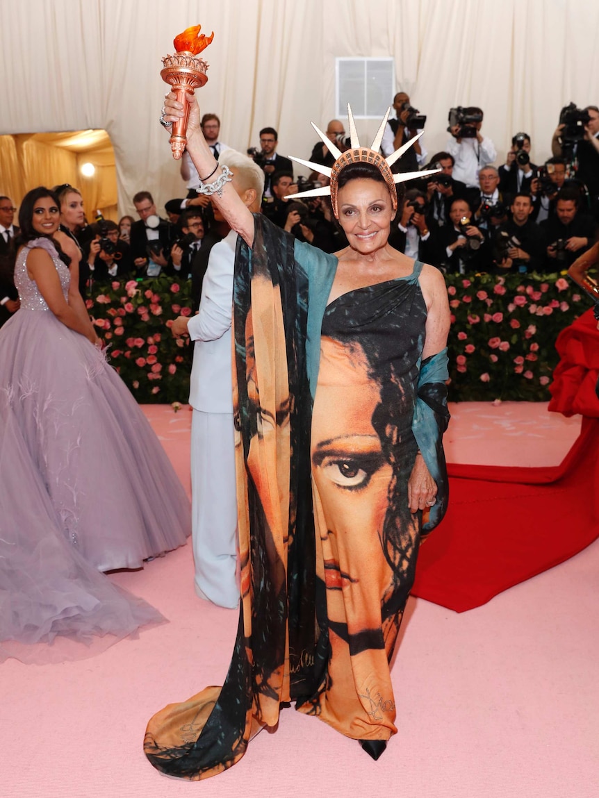 Diane von Furstenberg dressed like the Statue of Liberty