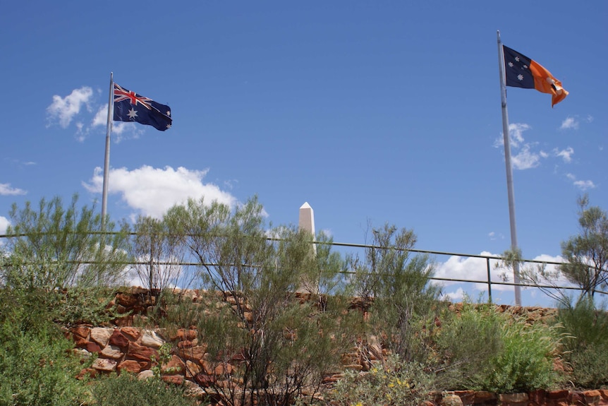 Two flags fly at Anzac Hill in Alice Springs.