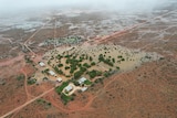 Aerial image of flood water surrounding Rawlinna Station after a storm passed over the Nullarbor