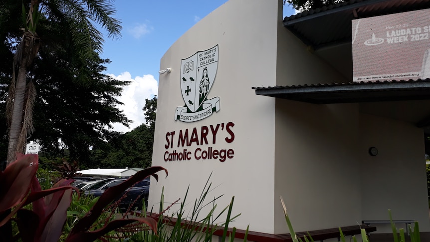 the facade of a building bearing the St Mary's Catholic College logo